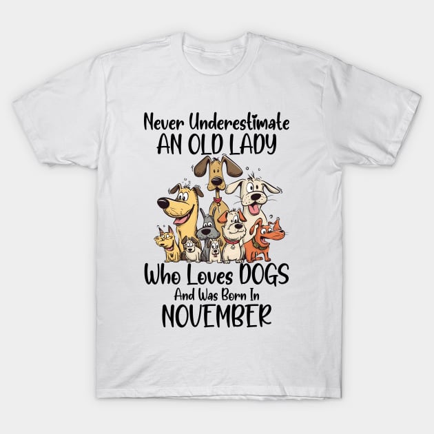 Never Underestimate An Old Lady Who Loves Dogs And Was Born In November T-Shirt by D'porter